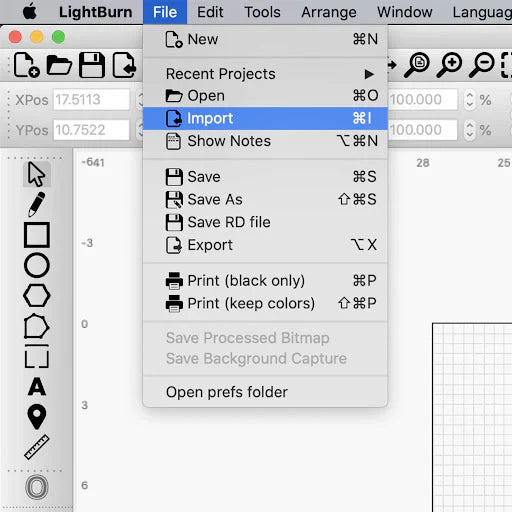 “LightBurn laser engraving software screenshot showing the File menu with the Import option highlighted for importing SVG/DXF files.”