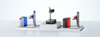 “OMTech fiber laser marking machines shown in a lineup, illustrating MOPA and non-MOPA models in a clean studio setup.”